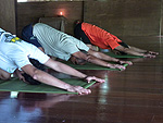 Athletes practicing yoga for the first time before the Amazon Race Forest event